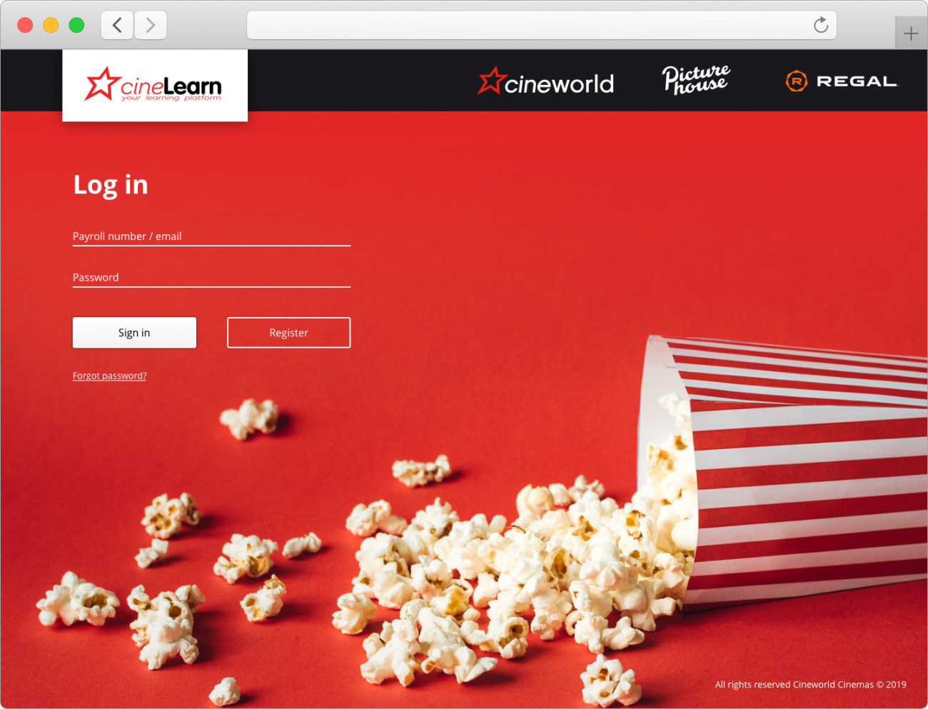 Early login designs for the Cineworld LMS, featuring a strong red background and popcorn that has been knocked over.